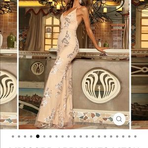 Beautiful, elegant and classy looking dress. Never worn, loved it but too small